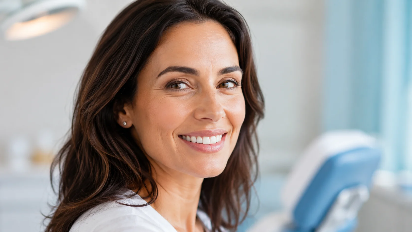 Close-up of a woman with restored cheek volume reducing under-eye shadow at Adult and Pediatric Dermatology in Forest Hills